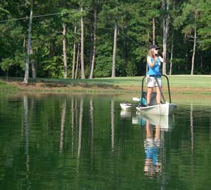 Gretchen casts from the Freedom Hawk kayak...