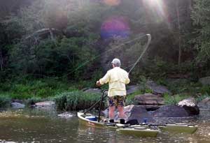 Pauls cast to a rocky run from the Freedom Hawk kayak...