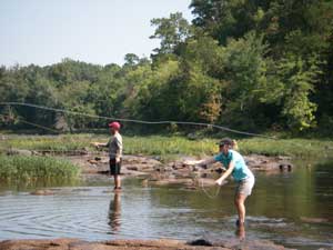 Gretchen & Tim cast to shoal bass on the Flint...